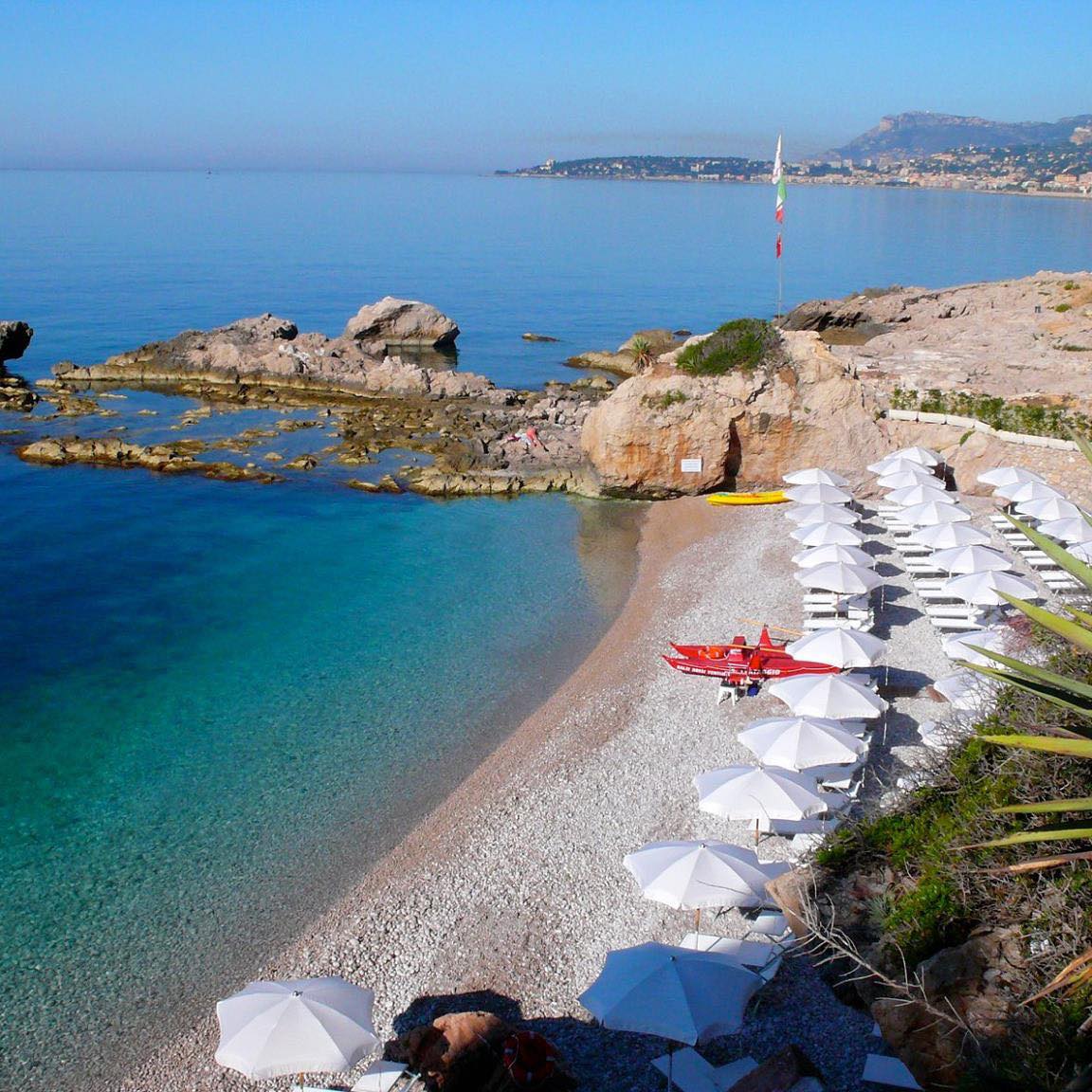 Spiaggia dei Balzi Rossi red cliffs near Ventimiglia, Liguria